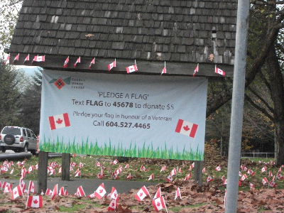 カナダ国旗を立てて募金