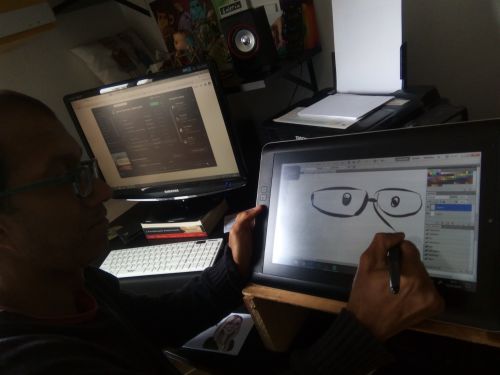 タブレット上で似顔絵を描き、特別の転写紙にプリント